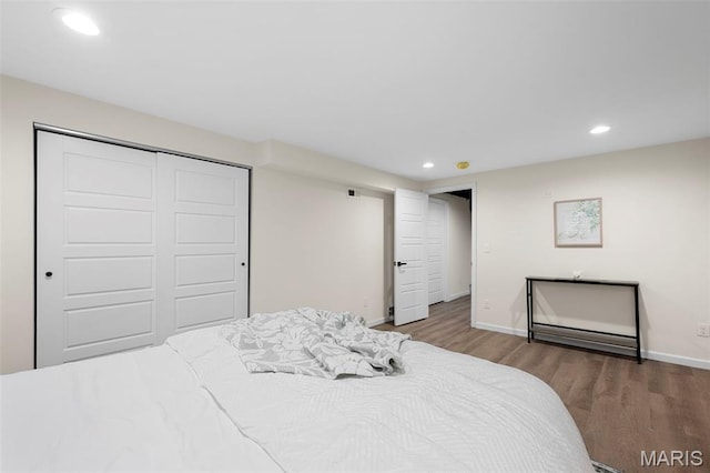 7944 Lavington Dr, Richmond Heights, MO 63117 - bedroom with wood finished floors, recessed lighting, and a closet