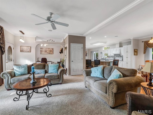 394 Sunset Echo Rd, Union, MO 63084 - living area with ornamental molding, carpet floors, arched walkways, a ceiling fan, and recessed lighting