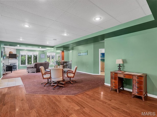 394 Sunset Echo Rd, Union, MO 63084 - dining area featuring wood finished floors and a fireplace