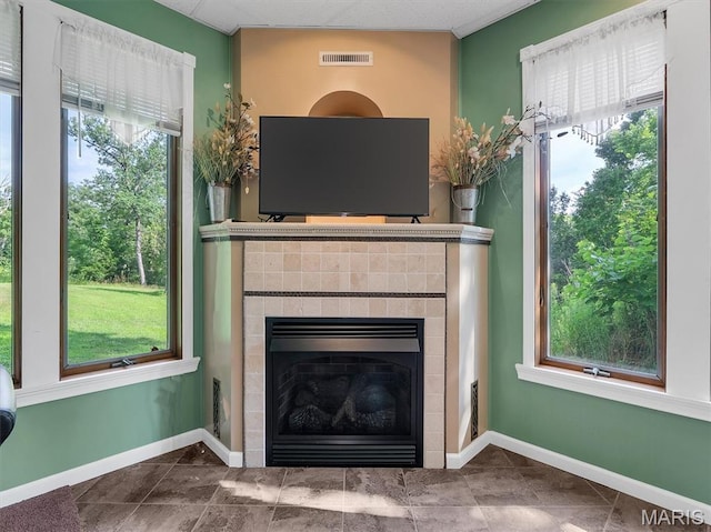394 Sunset Echo Rd, Union, MO 63084 - detailed view of a tiled fireplace and baseboards