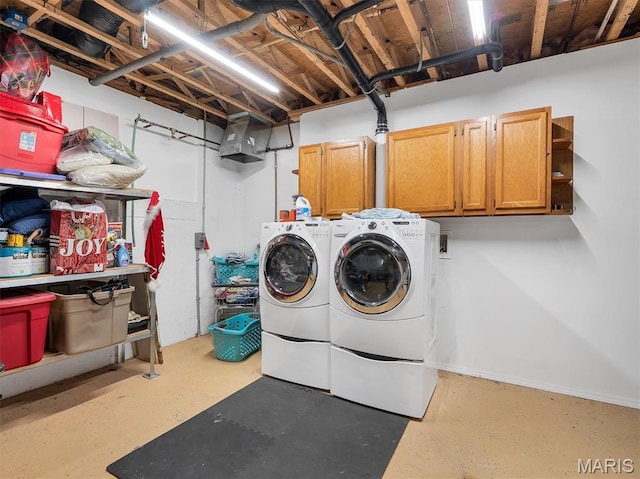 394 Sunset Echo Rd, Union, MO 63084 - washroom with cabinet space and washing machine and dryer