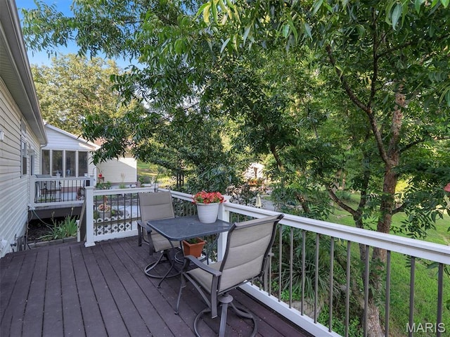 394 Sunset Echo Rd, Union, MO 63084 - wooden deck with a sunroom