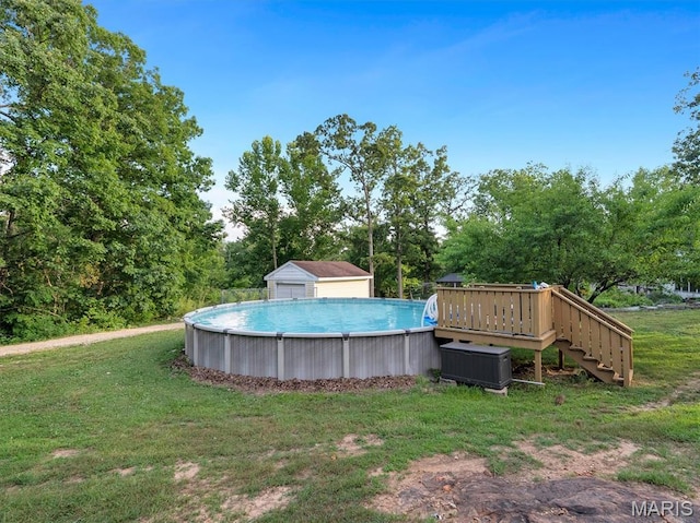 394 Sunset Echo Rd, Union, MO 63084 - view of green lawn featuring an outdoor pool, a wooden deck, stairway, and view of scattered trees