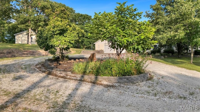 394 Sunset Echo Rd, Union, MO 63084 - view of yard with an outbuilding and dirt driveway