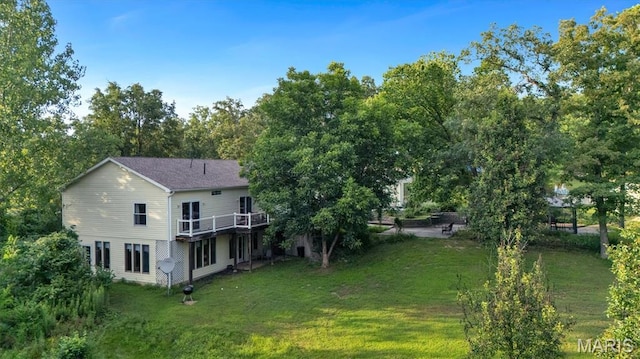 394 Sunset Echo Rd, Union, MO 63084 - rear view of house featuring a lawn and a wooden deck
