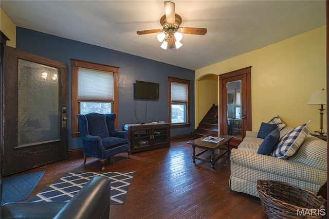 2324 Grand Ave, Granite City, IL 62040 - living room featuring hardwood / wood-style flooring, a ceiling fan, arched walkways, and stairway