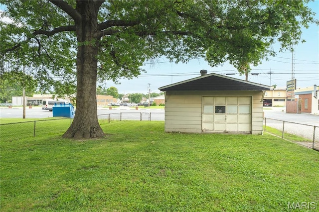 2324 Grand Ave, Granite City, IL 62040 - view of yard featuring an outdoor structure and a garage