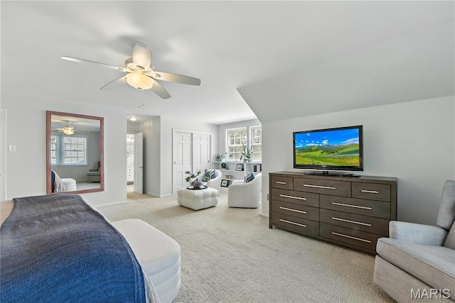 43 Highgate Rd, Olivette, MO 63132 - bedroom featuring light colored carpet, multiple windows, ceiling fan, and a closet