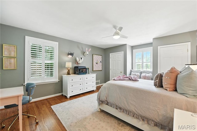 43 Highgate Rd, Olivette, MO 63132 - bedroom featuring wood finished floors, a ceiling fan, and a desk
