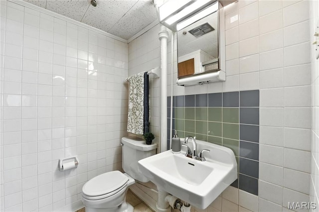 43 Highgate Rd, Olivette, MO 63132 - half bathroom with tile walls and toilet