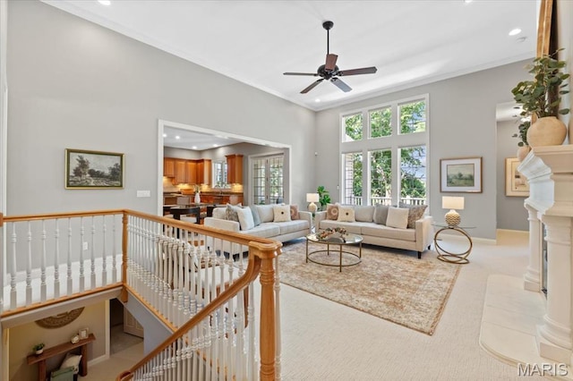 1931 Chesterfield Ridge Cir, Chesterfield, MO 63017 - living room featuring ceiling fan, crown molding, carpet, and recessed lighting