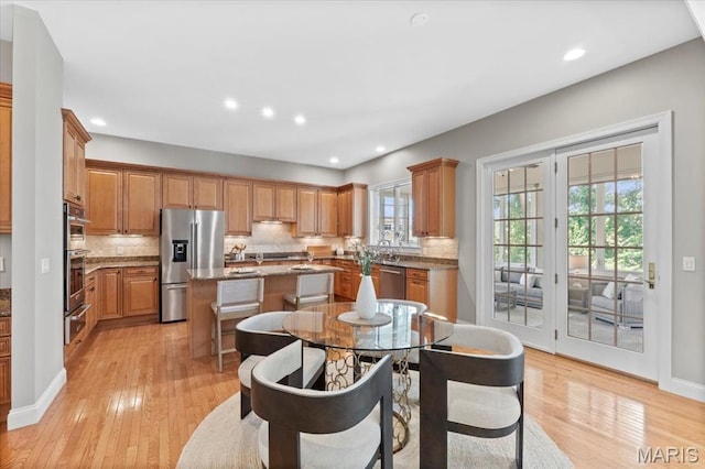 1931 Chesterfield Ridge Cir, Chesterfield, MO 63017 - dining room featuring light wood finished floors and recessed lighting