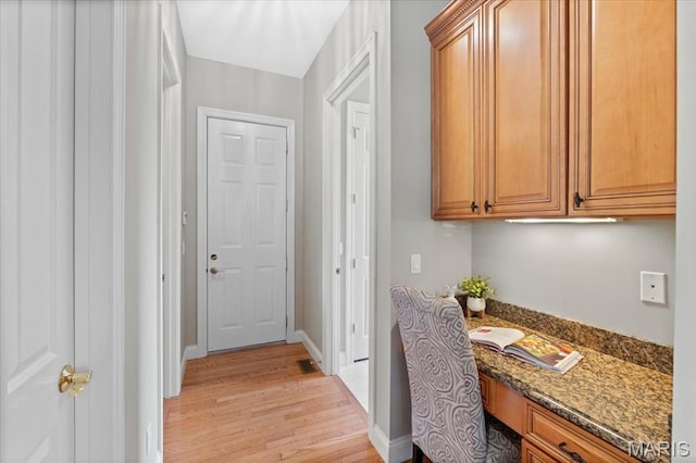 1931 Chesterfield Ridge Cir, Chesterfield, MO 63017 - office space with built in desk and light wood-type flooring