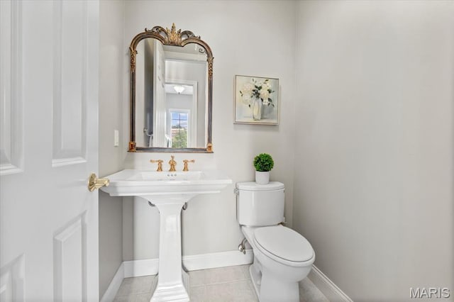 1931 Chesterfield Ridge Cir, Chesterfield, MO 63017 - half bath with toilet and tile patterned floors