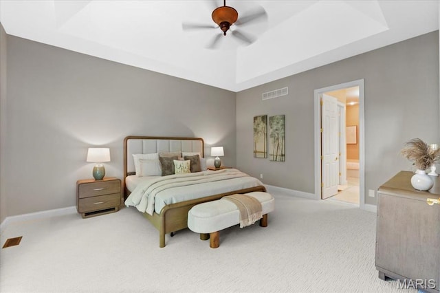1931 Chesterfield Ridge Cir, Chesterfield, MO 63017 - carpeted bedroom featuring a tray ceiling, ceiling fan, and ensuite bathroom