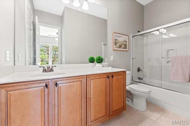 1931 Chesterfield Ridge Cir, Chesterfield, MO 63017 - full bath featuring double vanity, combined bath / shower with glass door, and tile patterned flooring