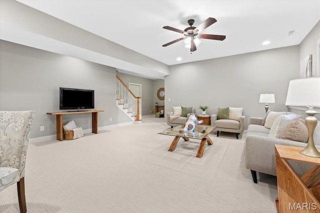 1931 Chesterfield Ridge Cir, Chesterfield, MO 63017 - living room with stairs, a ceiling fan, recessed lighting, and carpet