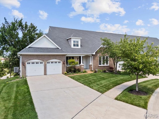 1931 Chesterfield Ridge Cir, Chesterfield, MO 63017 - view of front of property featuring brick siding, an attached garage, a front yard, concrete driveway, and covered porch
