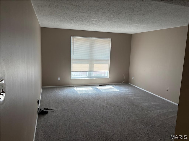 10335 Forest Brook Ln Unit C, Creve Coeur, MO 63146 - unfurnished room featuring carpet flooring and a textured ceiling