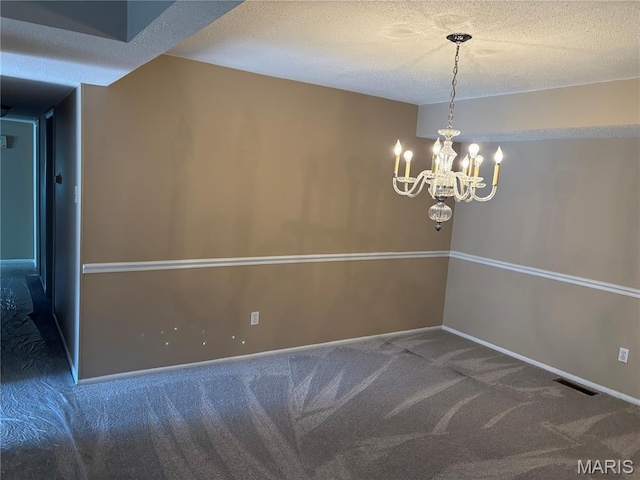 10335 Forest Brook Ln Unit C, Creve Coeur, MO 63146 - unfurnished dining area featuring carpet floors, a chandelier, and a textured ceiling