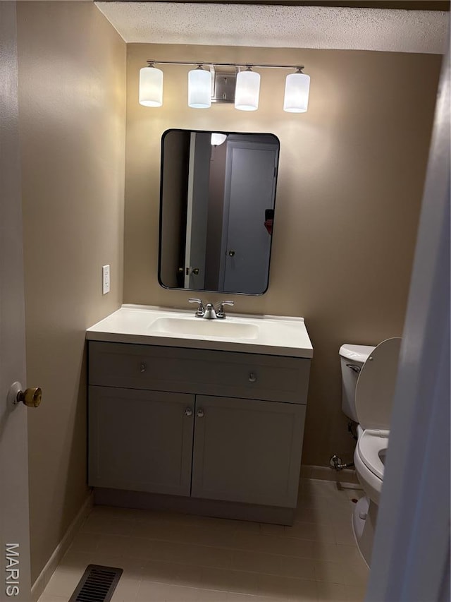 10335 Forest Brook Ln Unit C, Creve Coeur, MO 63146 - bathroom with vanity, tile patterned flooring, and a textured ceiling