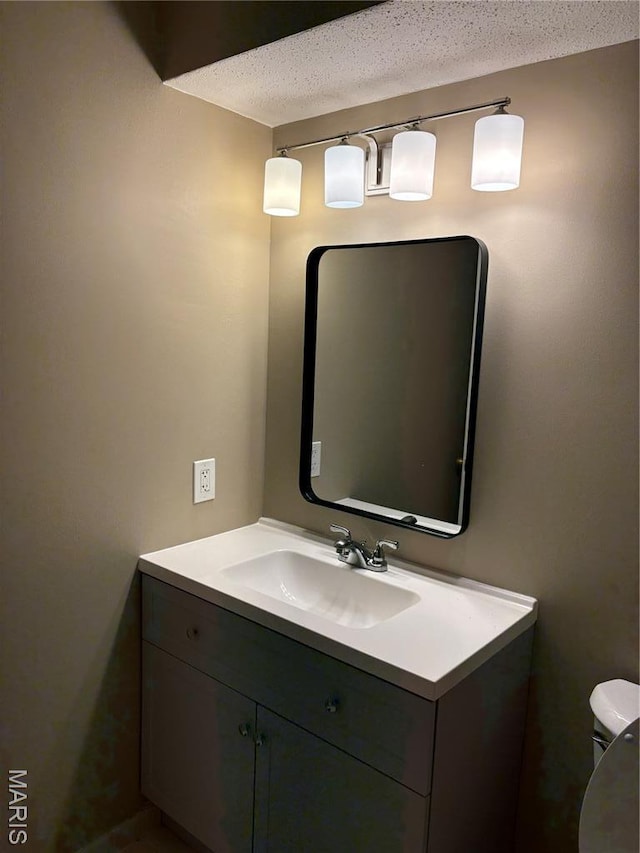 10335 Forest Brook Ln Unit C, Creve Coeur, MO 63146 - bathroom featuring vanity and a textured ceiling