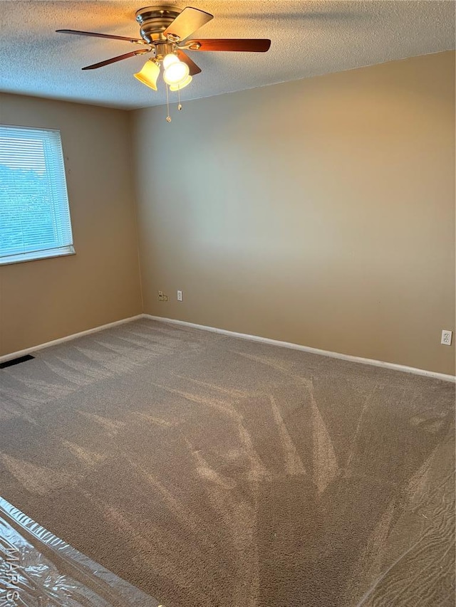 10335 Forest Brook Ln Unit C, Creve Coeur, MO 63146 - spare room with ceiling fan, carpet, and a textured ceiling