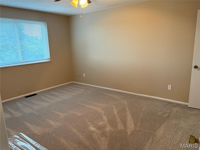 10335 Forest Brook Ln Unit C, Creve Coeur, MO 63146 - carpeted empty room with a ceiling fan and a textured ceiling