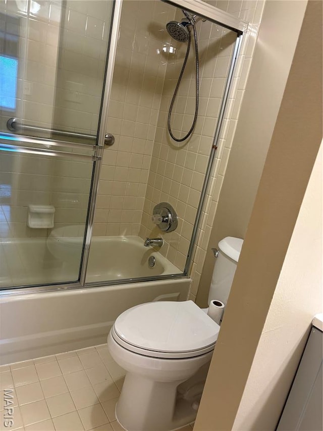 10335 Forest Brook Ln Unit C, Creve Coeur, MO 63146 - bathroom featuring bath / shower combo with glass door and tile patterned floors