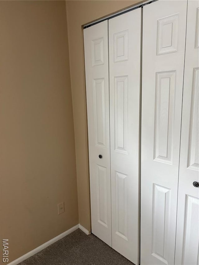 10335 Forest Brook Ln Unit C, Creve Coeur, MO 63146 - unfurnished bedroom with dark carpet and a closet