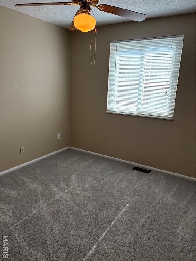10335 Forest Brook Ln Unit C, Creve Coeur, MO 63146 - empty room featuring ceiling fan, carpet, and a textured ceiling