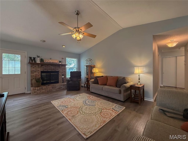 607 Apple Glen Ct, Arnold, MO 63010 - living room featuring vaulted ceiling, wood finished floors, ceiling fan, and a fireplace