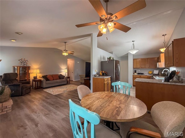 607 Apple Glen Ct, Arnold, MO 63010 - dining space with a ceiling fan, lofted ceiling, and light wood-style flooring