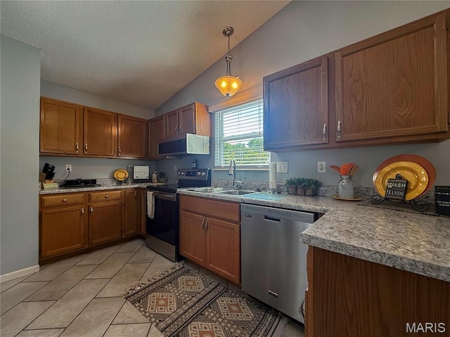 607 Apple Glen Ct, Arnold, MO 63010 - kitchen with appliances with stainless steel finishes, vaulted ceiling, brown cabinets, light tile patterned flooring, and hanging light fixtures