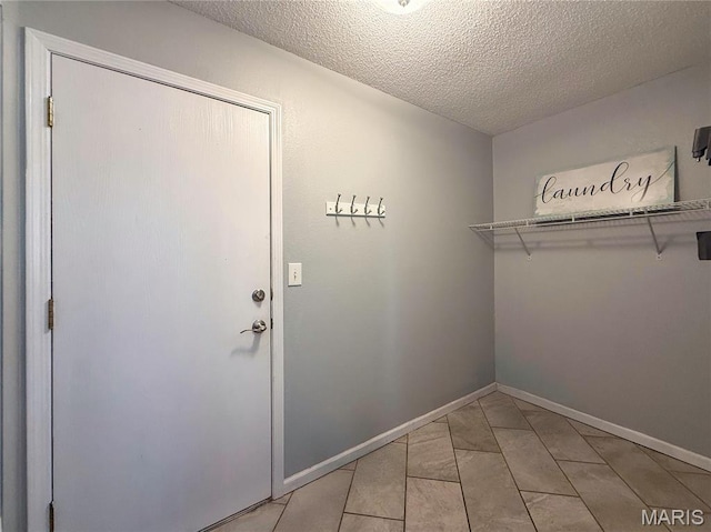 607 Apple Glen Ct, Arnold, MO 63010 - entryway with a textured ceiling and baseboards