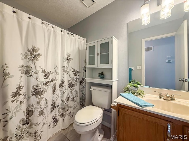 607 Apple Glen Ct, Arnold, MO 63010 - bathroom featuring vanity, a textured ceiling, tile patterned floors, and a shower with shower curtain