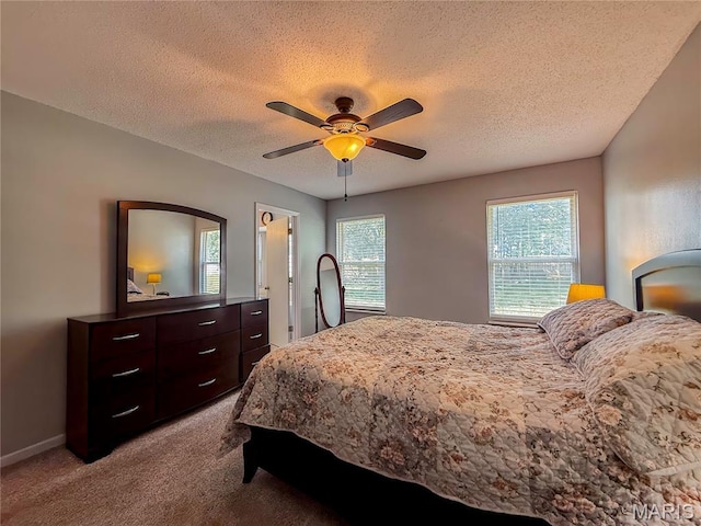 607 Apple Glen Ct, Arnold, MO 63010 - carpeted bedroom featuring a textured ceiling and a ceiling fan