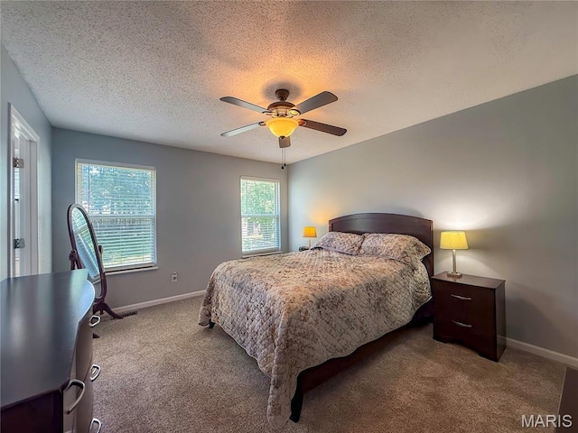 607 Apple Glen Ct, Arnold, MO 63010 - carpeted bedroom with a textured ceiling and ceiling fan