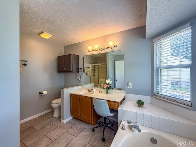 607 Apple Glen Ct, Arnold, MO 63010 - full bath featuring a textured ceiling, vanity, a bath, a stall shower, and tile patterned floors