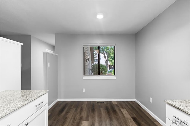 11724 Russet Meadow Dr, Creve Coeur Township, MO 63146 - unfurnished dining area with dark wood-style floors