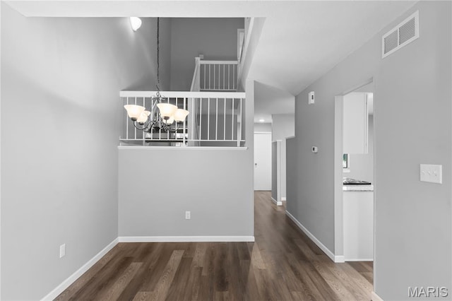 11724 Russet Meadow Dr, Creve Coeur Township, MO 63146 - spare room with a chandelier and wood finished floors