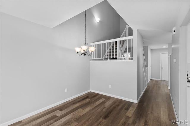 11724 Russet Meadow Dr, Creve Coeur Township, MO 63146 - unfurnished dining area featuring wood finished floors, a chandelier, and stairs