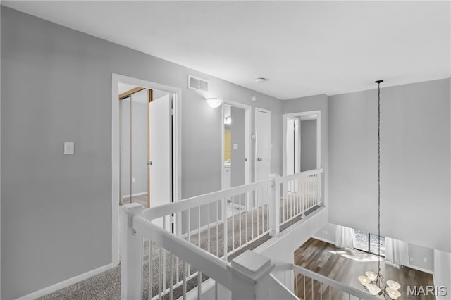 11724 Russet Meadow Dr, Creve Coeur Township, MO 63146 - hall with a chandelier and an upstairs landing