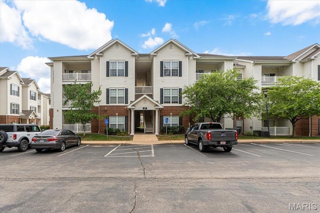 27 Kassebaum Ln Unit 302, Mehlville, MO 63129 - view of building exterior featuring uncovered parking