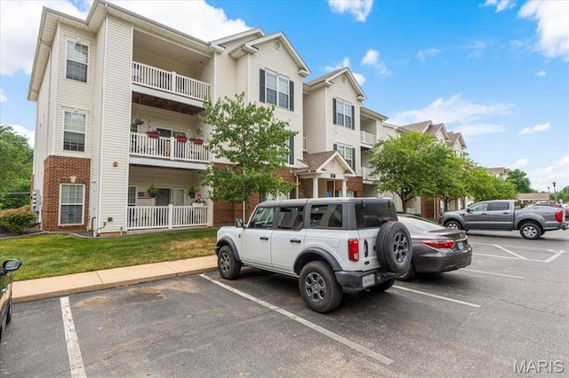 27 Kassebaum Ln Unit 302, Mehlville, MO 63129 - view of building exterior with uncovered parking