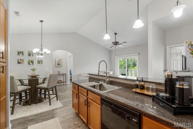 27 Kassebaum Ln Unit 302, Mehlville, MO 63129 - kitchen with dishwasher, arched walkways, light wood-style floors, ceiling fan, and lofted ceiling