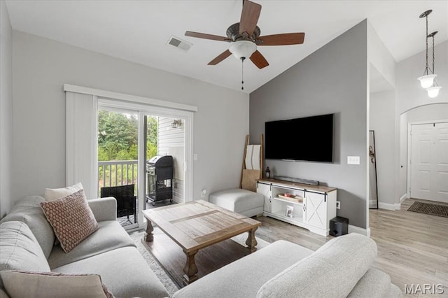27 Kassebaum Ln Unit 302, Mehlville, MO 63129 - living area featuring lofted ceiling, a ceiling fan, and light wood-style floors