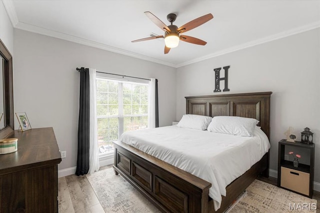27 Kassebaum Ln Unit 302, Mehlville, MO 63129 - bedroom featuring ornamental molding, light wood finished floors, and a ceiling fan