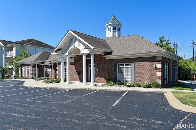 27 Kassebaum Ln Unit 302, Mehlville, MO 63129 - view of property featuring uncovered parking