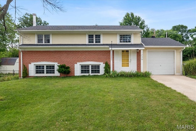1239 Vero Ln, Ellisville, MO 63011 - traditional home featuring concrete driveway, a garage, a front lawn, and brick siding